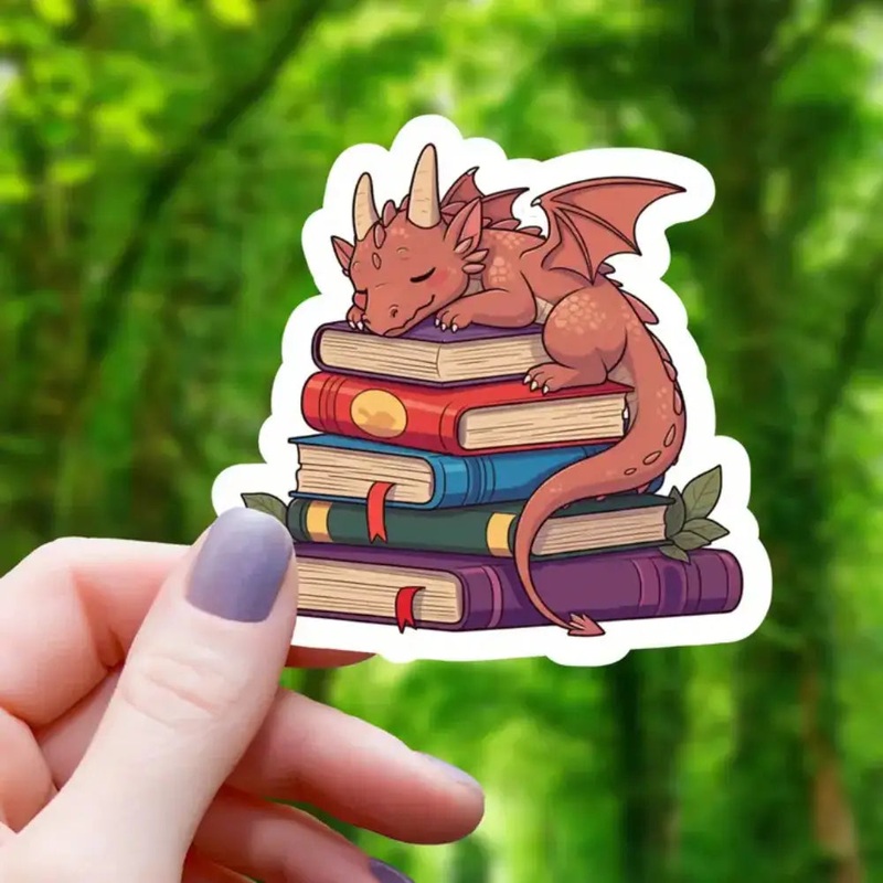 Dragon Sleeping on Books Sticker